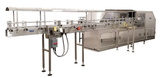 Bevco 510 Rinsers with Safety Covers attached to a conveyors