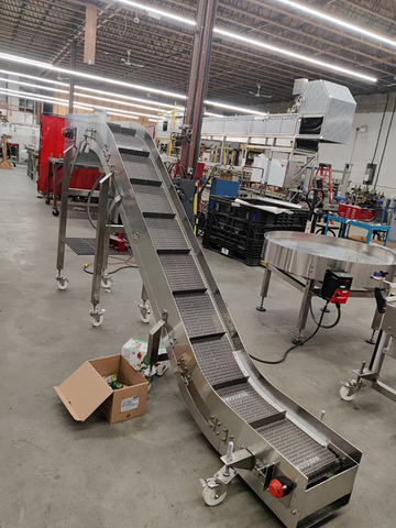 Custom Conveyor Solution: Applesauce Pouch Incline Conveyor